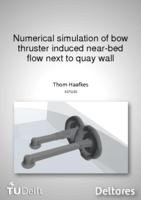 Numerical simulation of bow thruster induced near-bed flow next to quay wall