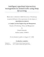 Intelligent signalized intersection management for mixed traffic using Deep Q-Learning