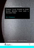 Fatigue Crack Growth in Solid Round Metallic Bars with a Shoulder Fillet