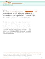 Fluctuations in the electron system of a superconductor exposed to a photon flux