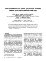 Near-field self-induced hollow spot through localized heating of polycarbonate/ZnS stack layer
