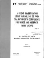 A flight investigation using variable glide path trajectories to compensate for winds and moderate wind shears